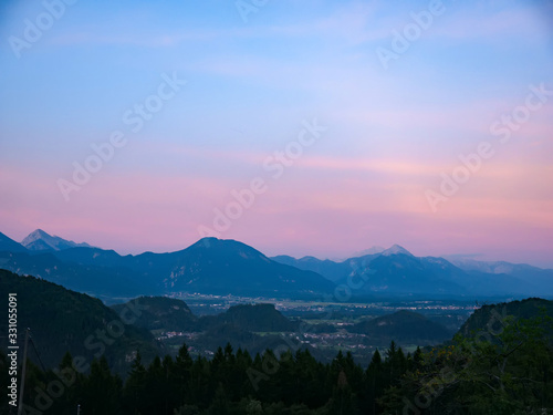 View on the beautiful sunrise over the majestic hills with the Lake Bled in Slovenia
