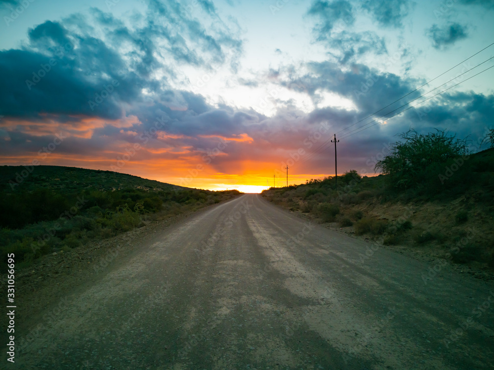 Sunset, sunrise on dirt road
