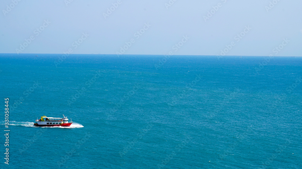 a tourist ship crossing the sea