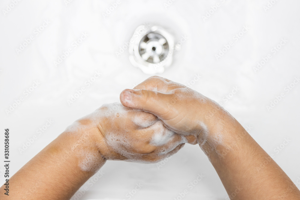 Fototapeta premium child washing hands