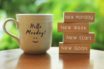 Gordijnen Quotes Hello Monday quote met koffiekop  © Maria Marganingsih