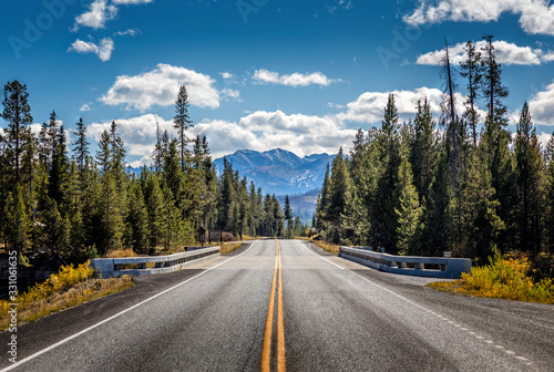 Road from Yellowstone National Park to Grand Teton National Park, Wyoming, USA photo