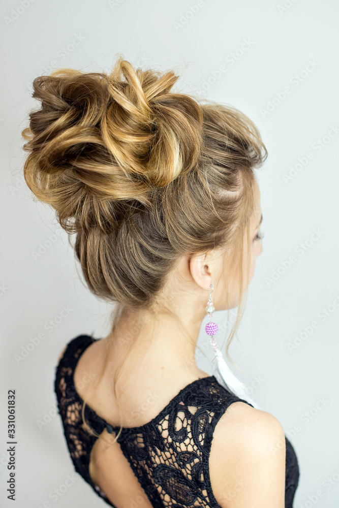 Fototapeta girl with hairstyle look from behind hairdresser hair stylist