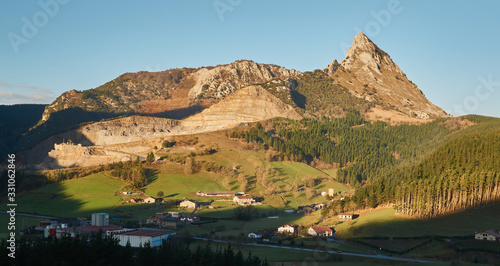 Mugarra Peak at dawn Mountains with the first lights of the day and views over the valley In the Basque Country Urkiola Natural Park