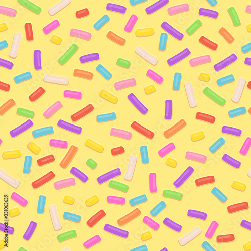 Seamless pattern repeating seamless texture of yellow donut glaze with many decorative sprinkles.Vector confectioners icing for cakes and donuts.