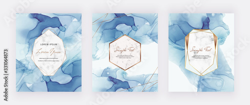 Blue alcohol ink cards with marble and gold polygonal frames. Abstract hand painted background. Fluid art painting design. Trendy template for banner, flyer, wedding invitation