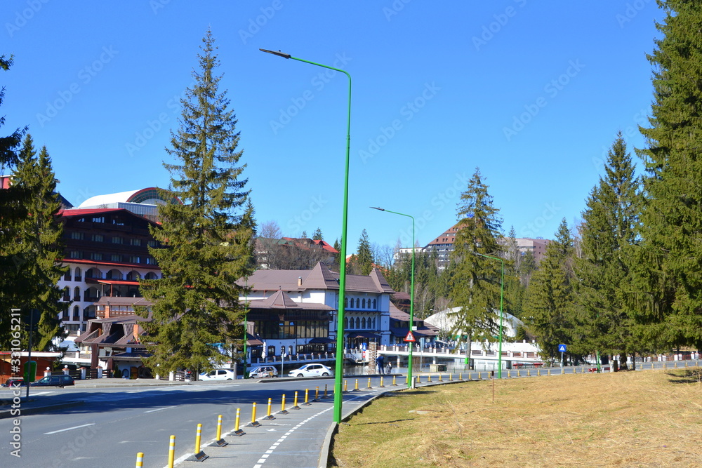 Fototapeta premium Winter and touristic station Poiana Brasov, 12 km from Brasov, a town situated in Transylvania, Romania, in the center of the country