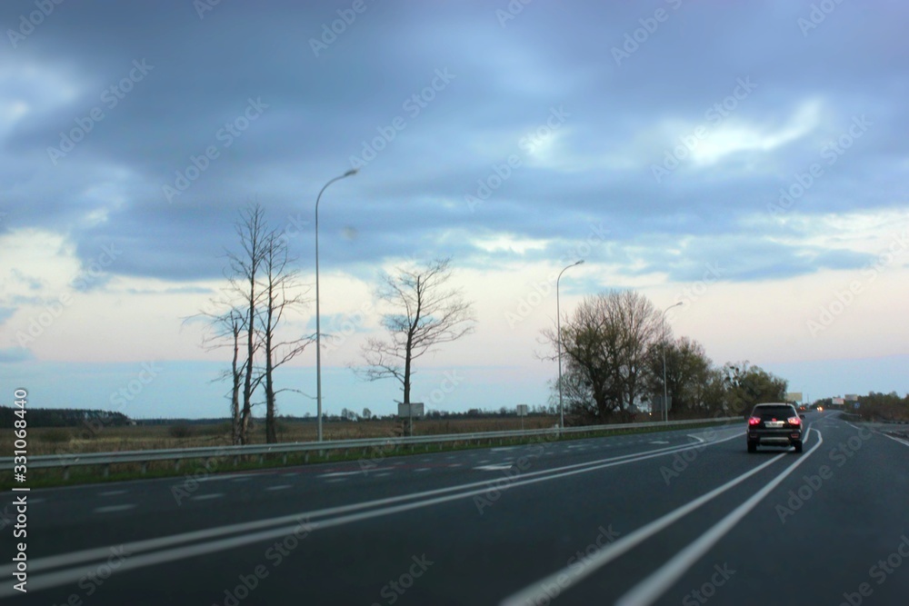 Fototapeta premium The car is driving on the road.