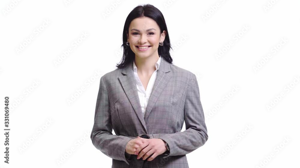 Businesswoman with clenched hands laughing isolated on white