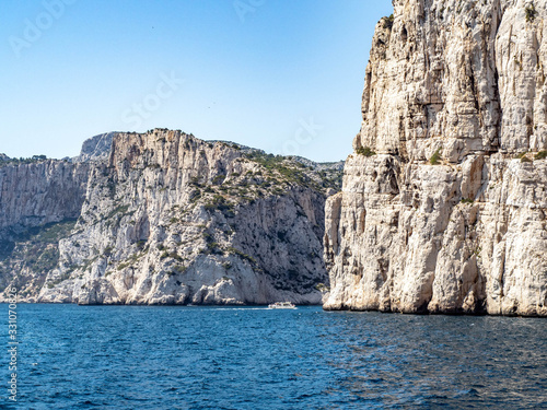 Calanques or narrow inlets formed by steep limestone cliffs near Cassis on the French Riviera.