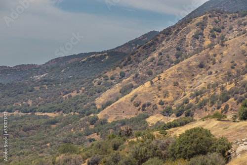 Cars on the Kings Canyon Road in Sierra Nevada Mountain  California  USA.