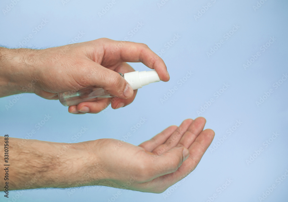 Two hands with sanitizer for skin cleansing and prevention of coronavirus infection, symbol of personal hygiene and sanitary protection Two hands with sanitizer for skin cleansing and prevention of coronavirus infection, symbol of personal hygiene and sanitary protection