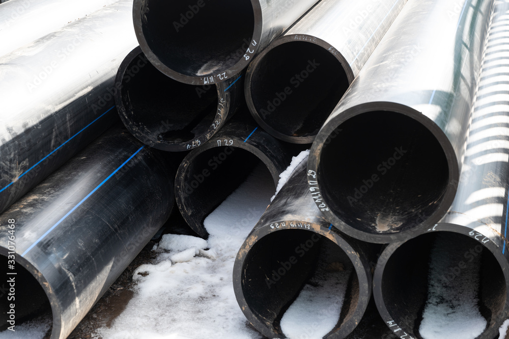 Drinking water pipes outdoor in springtime Drinking water pipes outdoor in springtime
