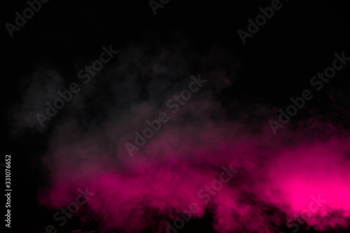 Pink smoke isolated on black background
