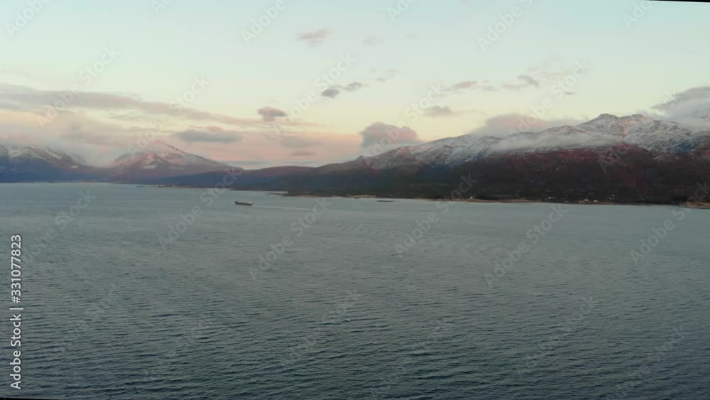 aerial fly over tilted shot with view of islands and coastal road in northen Norway Lofoten islands aerial fly over tilted shot with view of islands and coastal road in northen Norway Lofoten islands