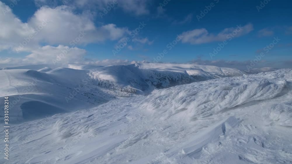 Mountain cloudy and windy view. Ski resort Dragobrat, Carpathian mountains, Ukraine. Mountain cloudy and windy view. Ski resort Dragobrat, Carpathian mountains, Ukraine.