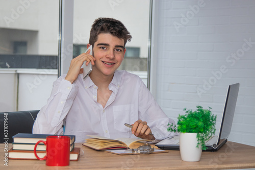 teenage student at home or college at the desk