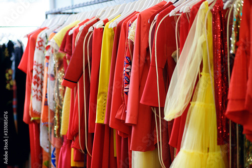 womens dresses on a hanger, multi-colored dresses in the trading floor