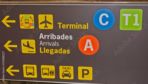 BARCELONA, SPAIN - 27.02.2020: Screens panels with information for the travelers in transit at Terminal 2 of Barcelona el Prat - Josep Tarradellas international airport photo