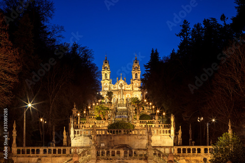 Sanctuary of Nossa Senhora dos Remedios and monumental staircase in Lamego, Portugal, at dusk.