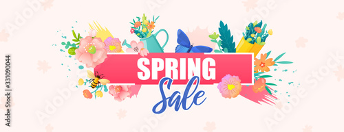 Spring sale ad text decorated with flowers.