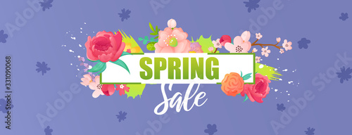 Spring sale ad text decorated with flowers.