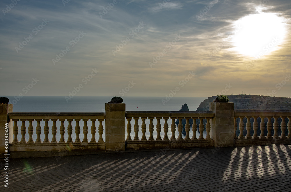 Sea mountain landscape, view from the terrace with balusters.
