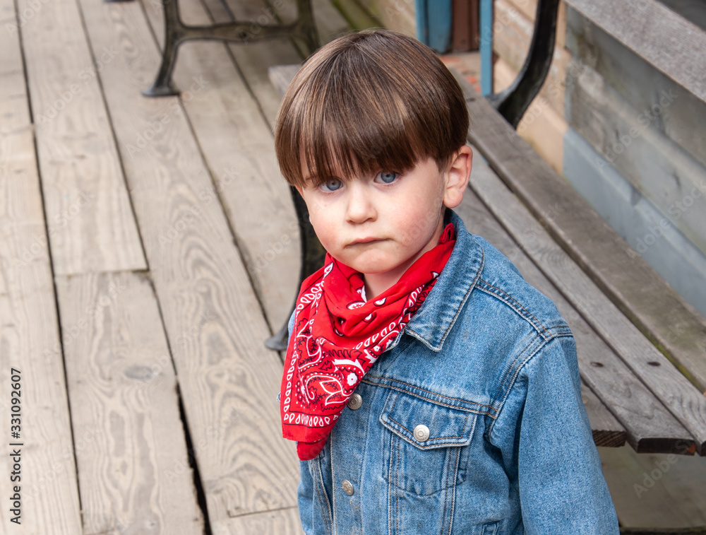 Closeup of little boy with blue eyes, pouting. Closeup of little boy with blue eyes, pouting.