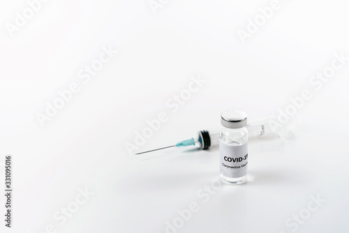 Bottle of corona virus COVID-19 vaccine. Coronavirus 2019-nCoV COVID concept. White background isolated with copyspace