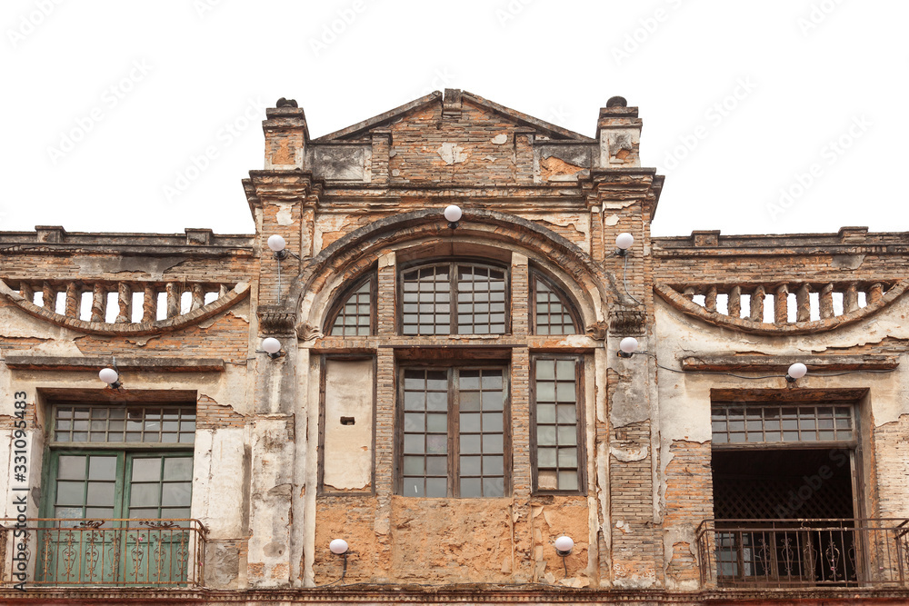 The facade of old abandoned building with broken and peeled wall and door and window in the traditional old style town,Fuzhou,Fujian,China