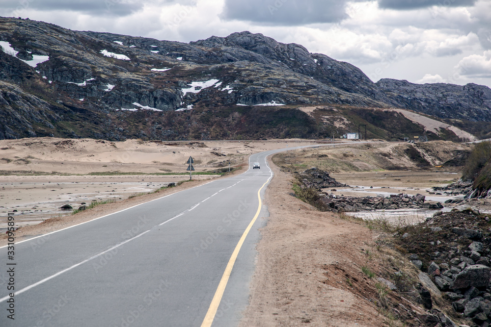 Road in the mountains. The roads of the Kola Peninsula. Russian north.