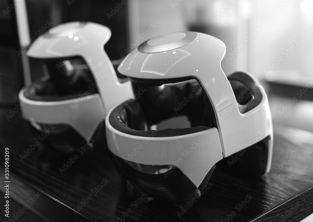 Naklejka premium Innovative modern helmet for medical diagnostics black-white photo.