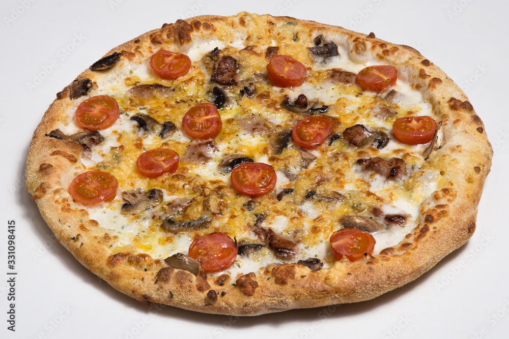 Pizza with mushrooms, tomatoes