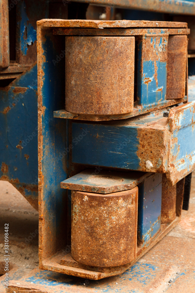 Rusty Steel Rollers on Construction Equipment