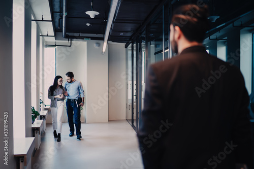 Business people meeting partner in corridor