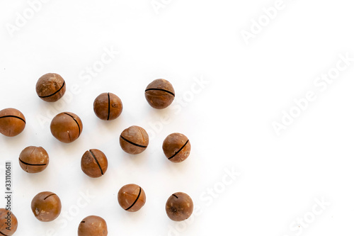 Wallpaper Mural Macadamia nuts in the shell isolated on a white background close-up. Torontodigital.ca
