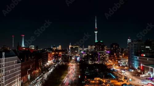 Timelapse of Berlin city panorama during the night as the traffic passes by