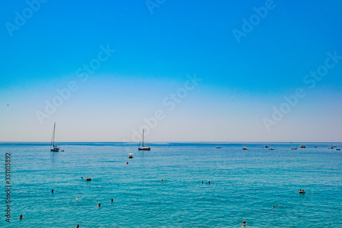 Boats at a calm sea in Cinque Terre Italy in a clean day