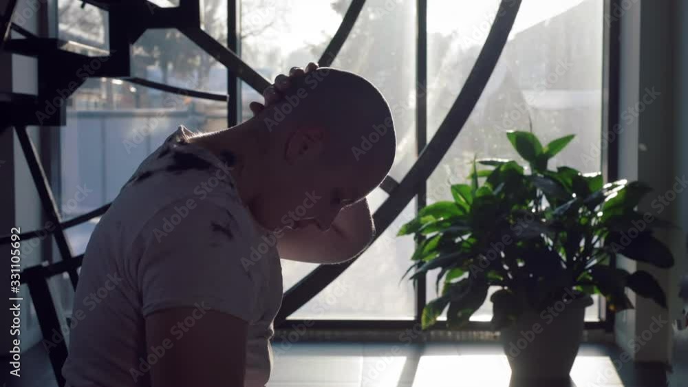 Lesbian girl shaves her hair bald with a trimmer. A woman removes hair on her head with an electric razor. The female wants to be like a male. Girl Butch. LGBT Community Concept, Pride. Slow motion Lesbian girl shaves her hair bald with a trimmer. A woman removes hair on her head with an electric razor. The female wants to be like a male. Girl Butch. LGBT Community Concept, Pride. Slow motion