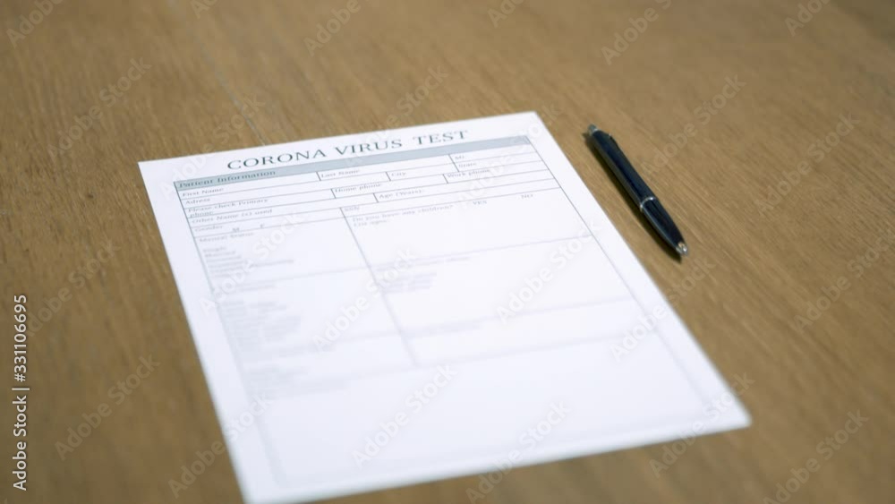 Close up on Corona virus test form. Focus point moving slowly forward. Close up on Corona virus test form. Focus point moving slowly forward.