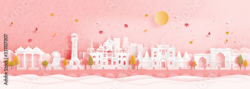 Autumn in Ahmedabad, India with falling maple leaves and world famous landmarks in paper cut style vector illustration