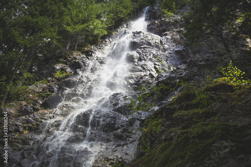 cascading waterfall over rocks