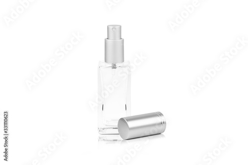 A mock up of empty container spray glass bottle is isolated on white color of background with clipping path.