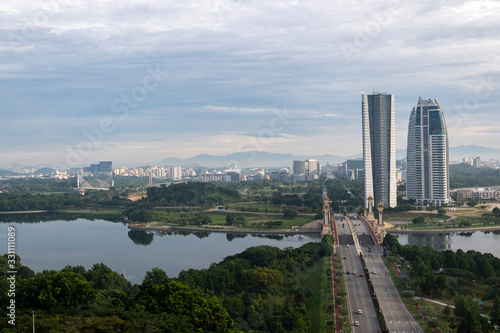 Beautiful scenery Putrajaya city surrounding by lake over cloudy sky background