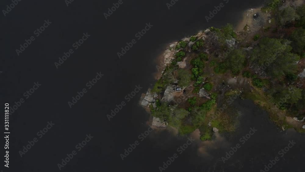 AERIAL: Droneshot lowering towards a norwegian island in 4K AERIAL: Droneshot lowering towards a norwegian island in 4K