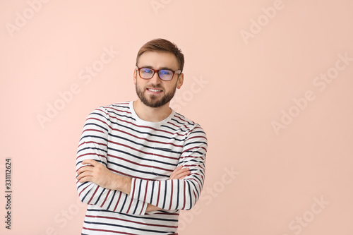 Young man with stylish eyeg...