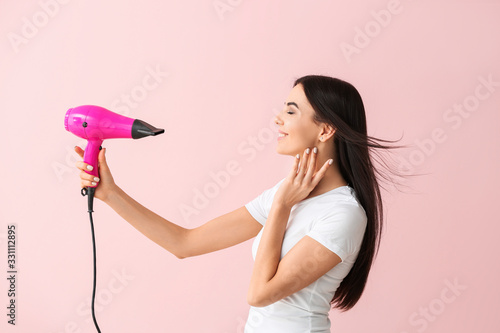 Beautiful young woman with ...