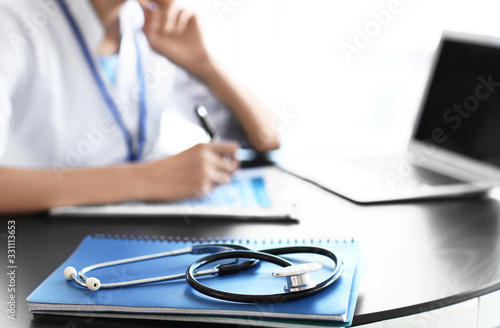 Stethoscope on table in doc...