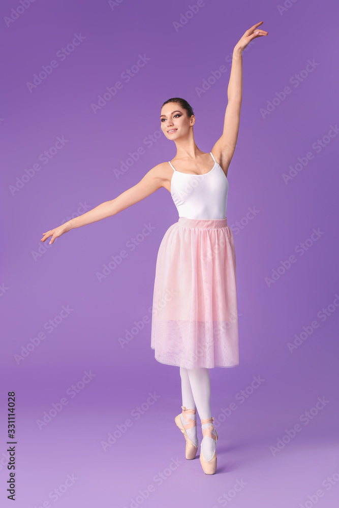 Beautiful young ballerina on color background Beautiful young ballerina on color background
