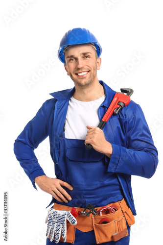 Handsome male worker on whi...
